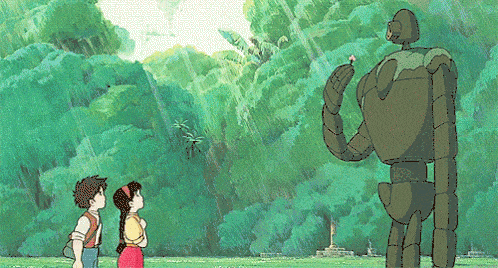Eine Szene aus dem Ghibli-Film "Das Schloss im Himmel" mit Pazu, Sheeta und einem Gärtner-Roboter.